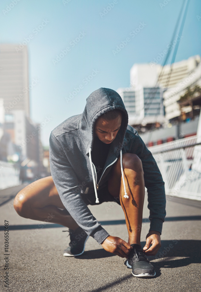 Sticker Runner, black man and shoes lace in city for cardio training, running exercise or fitness workout. Tie, bridge and African athlete on ground ready to start jog, race or marathon practice in footwear