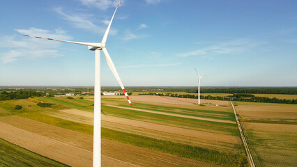 Close look of Wind turbine above agricultural land