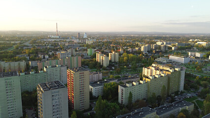 High-rise buildings at sunset with distant city view