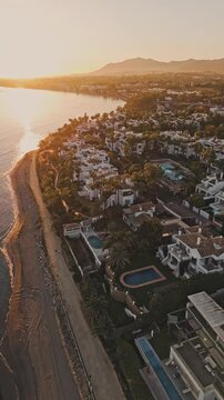 Aerial view of Marbella, Costa del Sol, Spain. Drone vertical video