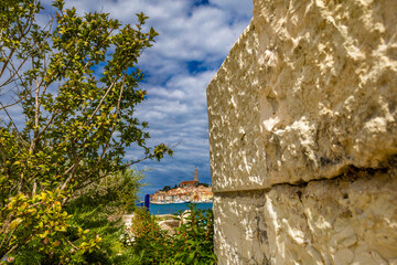 Panorama of the old city of lovers Rovinj, hot summer, ships in the roadstead,