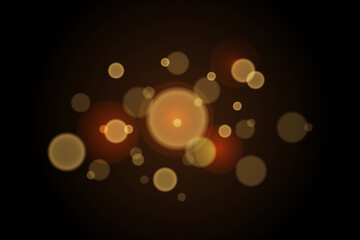 Christmas texture. Golden highlights on a dark background. The background is the lights of a big city. The bokeh effect.