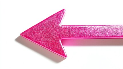 Fototapeta premium A vibrant pink glitter arrow pointing left on a white isolated background.