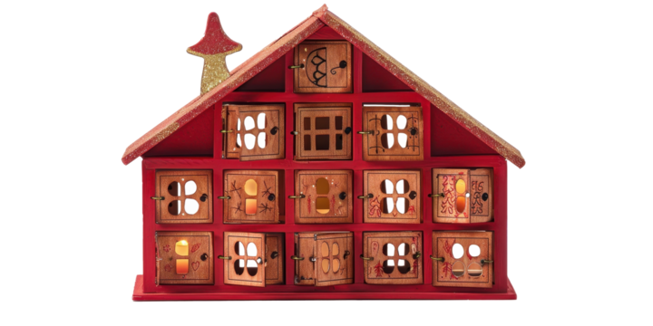 An open Advent calendar showing small windows on an isolated white background 