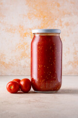 Traditional homemade canned tomatoes. Canned tomatoes prepared for winter meals
