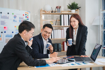 Office Collaboration: A dynamic team of business professionals,  engaged in a productive meeting, showcasing collaboration, strategic planning, and professional development.