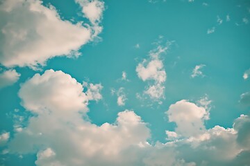 Fototapeta premium Blue sky background with white clouds. 