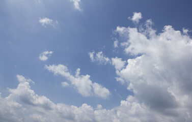 
Blue sky with puffy clouds