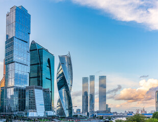 Obraz premium High buildings of Moscow-City at Moskva River at summer sunset, Russia.