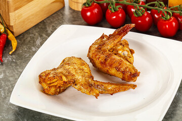 Tasty roasted chicken wing with spices