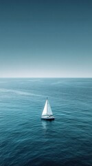 Obraz premium Peaceful sailboat amidst vast tranquil ocean blue