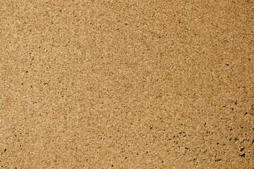 古い穴の開いたコルクボード掲示板の表面アップ　テクスチャー背景壁紙