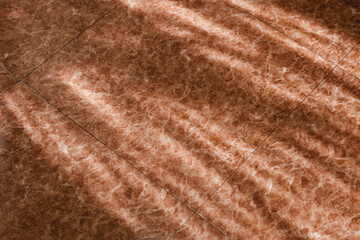 床のタイルに落ちた窓の日差し　太陽の日光　