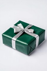 Obraz premium Elegant green gift box with silver ribbon
