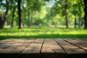 Fototapeta premium Wooden Tabletop with Blurry Green Forest Background
