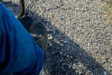 Foot Resting on Motorcycle Foot Peg During Outdoor Ride