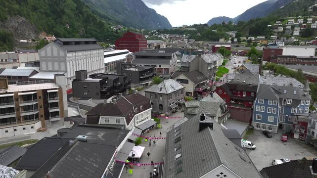Odda Village Centre at Hardanger Fjord in Vestland, Norway, Scandinavia - Aerial Drone View at Cloudy weather
