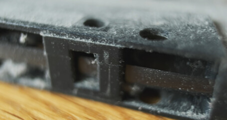 Dusty tape on an audio cassette. Macro, close-up