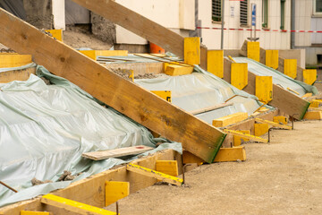 View of the construction and repair of steps near the building