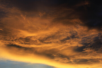Fototapeta premium sunset with clouds over the village in india