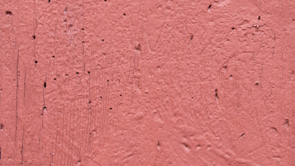 Textured wall of a brown cement wall