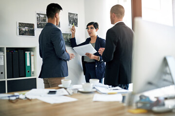 Documents, meeting and training with business people in office together for coaching or development. Conversation, feedback or review with employee man and woman group in corporate workplace