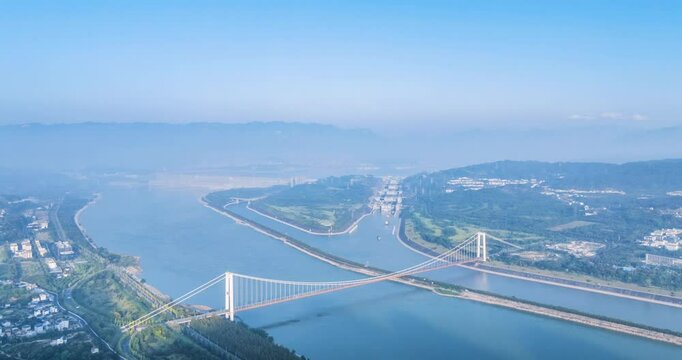aerial time lapse video of the three gorges water control project in early morning  , bird's-eye view of the Three Gorges Dam, Three Gorges Ship Lock, and Xiling Yangtze River Bridge ,Yichang, Hubei P