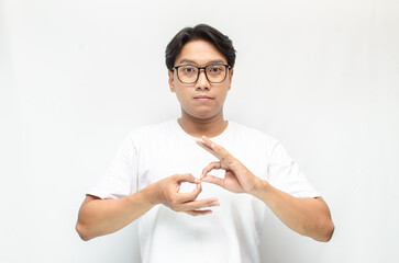 asian young students happily using sign language isolated against white background. Asian man...