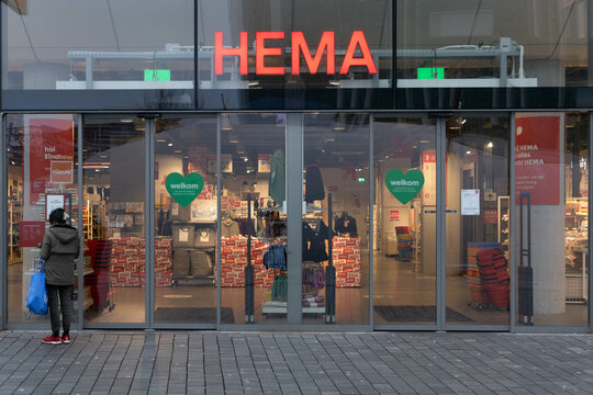 Hema logo above the store entrance, a discount retail chain shop in the streets of central Eindhoven. Eindhoven, the Netherlands. 7 January 2024. 