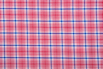 red and white checkered fabric a background or texture