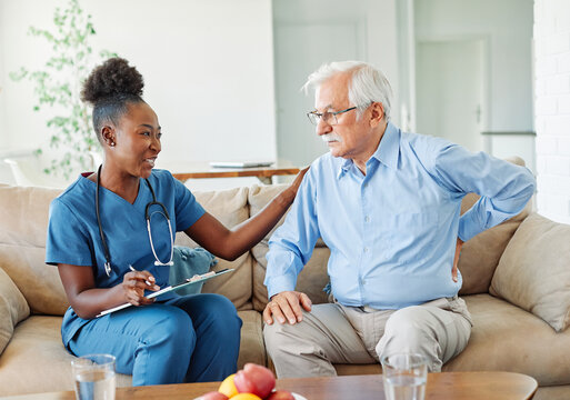 nurse senior ache backache home care patient pain elderly woman retirement nursing assistance  old man caregiver doctor health nursing home prescription