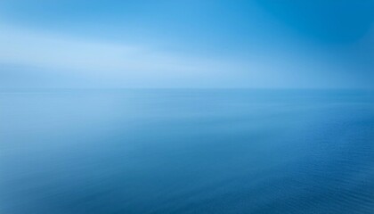 Fototapeta premium A long exposure morning white fog and nature background texture tranquil scene blue sea