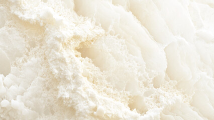 The background of this image is marble limestone texture in beige brown cream sepia color. 