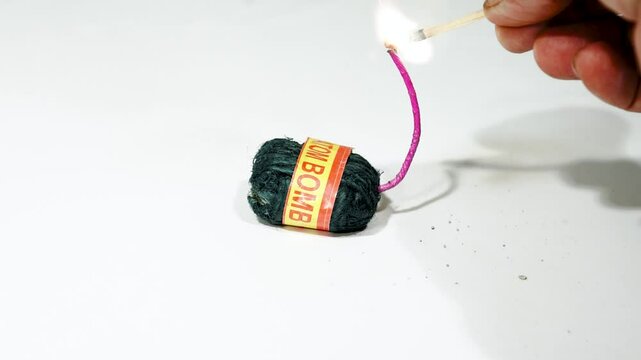 Diwali Bomb Lighting with Match Fire | Lighting a fuse bomb and waiting until it explodes