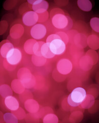 Abstract bokeh background in red, blue and white tones. Twinkling lights. 4th of July, Labor Day, Independence Day. Christmas decor. Holiday background for banners, posters and cards.
