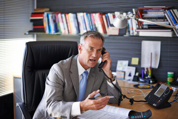 Angry, business and man with phone call in office for online conflict, financial mistake and...