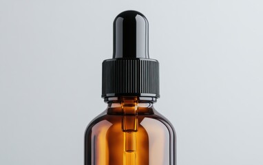 Fototapeta premium Amber glass bottle with a black pump for haircare and skincare products displayed in close-up view