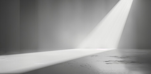 Photo of an abstract white background with a spotlight on the wall for product presentation