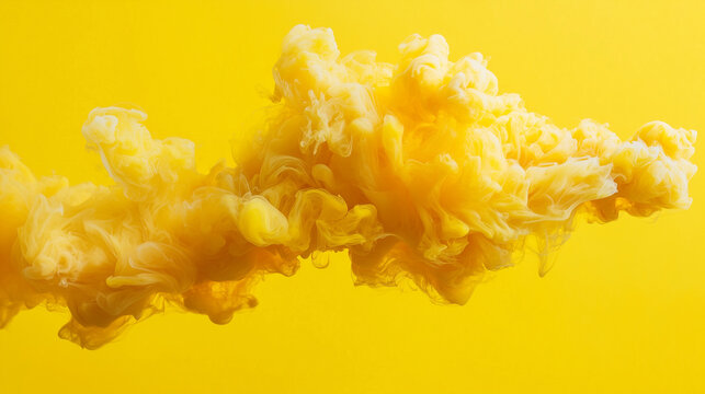 Abstract beauty background with yellow clouds of paint, yellow smoke on yellow background. Fashionable, modern background in pastel colors.