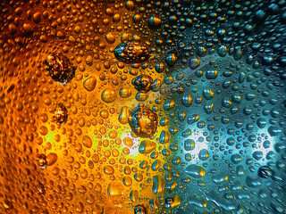 Colorful display showing how water and oil do not mix vivid tones macro shot hdr soothing,Colorful background with water drops on it