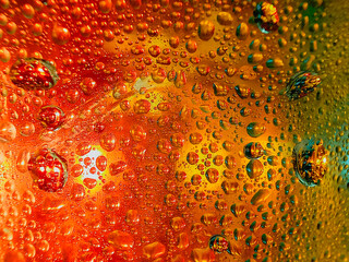 Colorful display showing how water and oil do not mix vivid tones macro shot hdr soothing,Colorful background with water drops on it