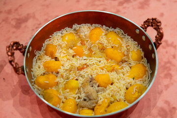 Traditional Brazilian dish chicken with pequi (caryocar brasiliense) and rice