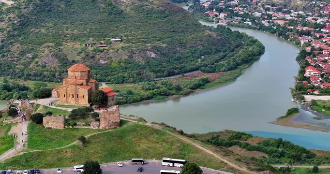 Drone flight over Jvari Monastery near Mtskheta, Georgia, on a sunny day, with beautiful views