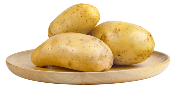 potatoes on wooden plate isolated