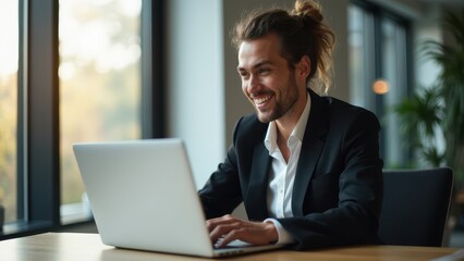 Fototapeta premium Happy Young Professional Working Remotely with Laptop in Cozy Environment