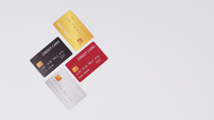 Four credit cards on white background.