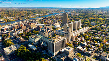 Albany cityscape and river view. A stunning aerial perspective of Albany, USA reveals the vibrant...