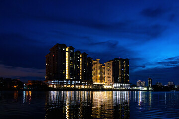 Kuching Riverine Resort, Riverine Emerald apartment building on south bank of Sarawak River in...