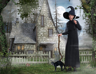 An old witch stands leaning on a stick in front of her witch's house