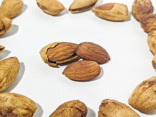 Almond seeds isolated on a white background, Fresh chocolate almonds